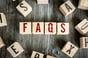 Wooden Blocks with the text Faqs